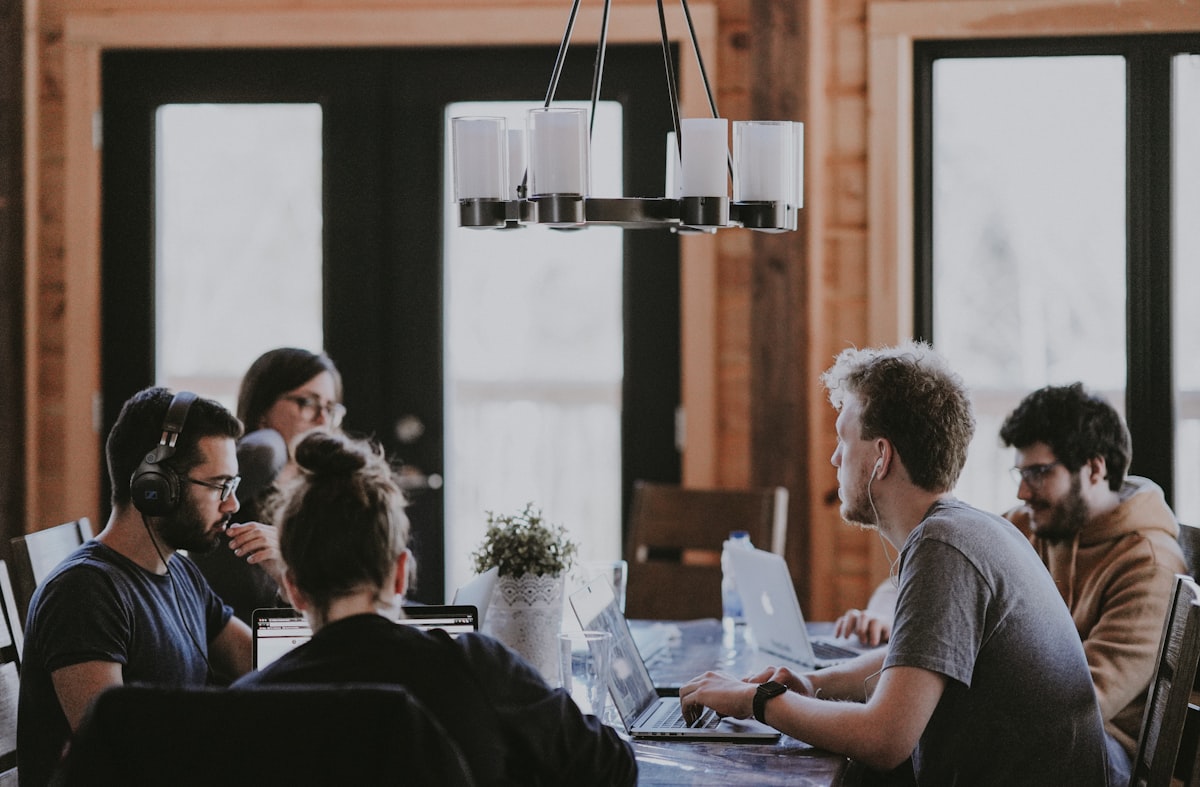 Consultants collaborating around a table
